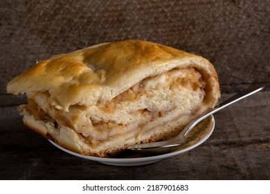 Apple Strudel Cake On Plate With Spoon