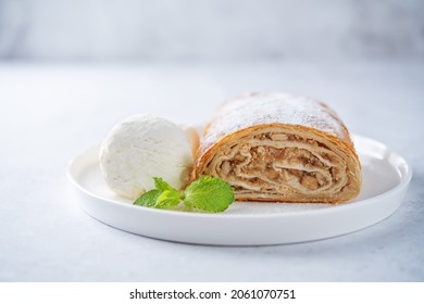 Apple strudel sweet cake in a plate. toning. selective focus