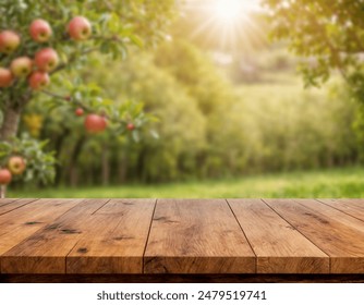 Apple tree background, wooden table top on super blurred background. used for display or wooden montage as your dining background. banners, boards, podiums - Powered by Shutterstock