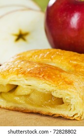 Apple Turnover With Fruit In The Background. Very Shallow Depth Of Field.