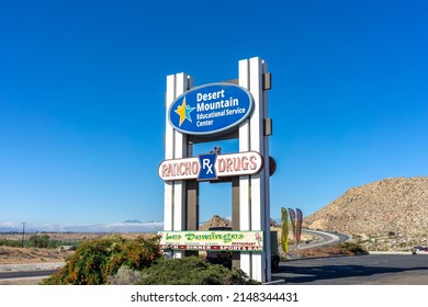 Apple Valley, CA, USA – April 20, 2022: Roadside Signage For Desert Mountain Educational Service Center, Rancho Drugs, And Los Domingos Restaurant Located In The Town Of Apple Valley, California.
