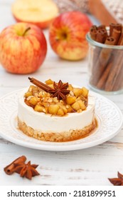 Apple vanilla mini cheesecake. Homemade cake made from shortbread cookies, mascarpone or cream cheese, caramelized apples with cinnamon and star anise. A healthy dessert. Breakfast. Selective focus - Shutterstock ID 2181899951