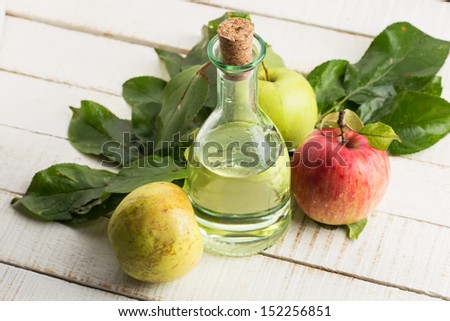 Apple vinegar and apples on white wooden table. Selective focus. Stok fotoğraf © 