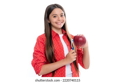 Apple Vitamins For Healthy Teeth. Teenage Girl Brushing Her Teeth. Teen Holds A Toothbrush In Hand Brushing Her Teeth Morning Routine Dental Hygiene, Teeth Care.