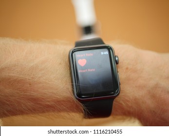 Apple Watch On Male Hand Close Up Showing Time And Heart Rate