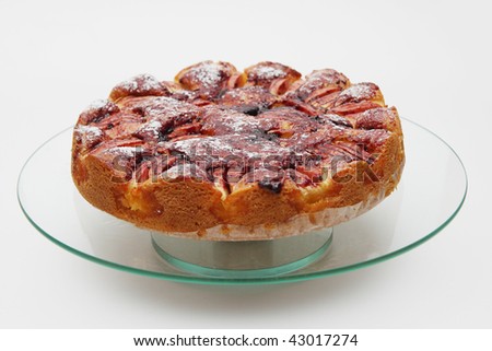 Applepie on white background on a glas plate