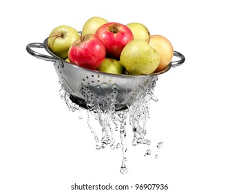 Apples In Colander With Water Splash