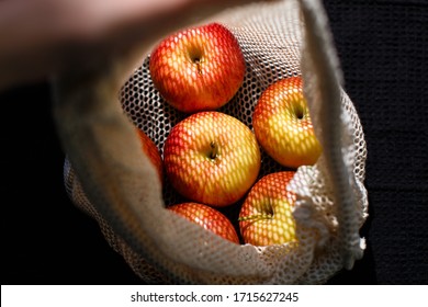 Apples In An Eco-friendly Bag, Placed On A Black Tea Towel