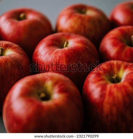 Apples on a lightblue table