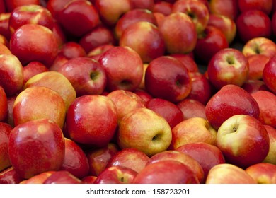Apples on a market stall in Harbour Town, Queensland, Australia. Full-frame, Background.