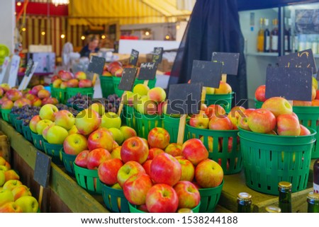 Apples and other fruits on sale in the Jean-Talon Market Market, Little Italy district, Montreal, Quebec, Canada
