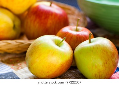 Apples With A Vintage Quilt And A Green Bowl - Braeburn Variety