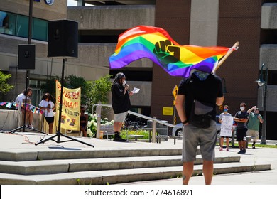 Appleton, Wisconsin / USA - July 11th, 2020: Black lives matter and lgbt individuals held a rally at houdini plaza and marched to appleton police department to protest against police brutality. 
