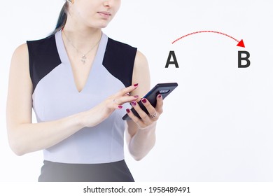 Application for building route concept. Moving from point A to point B. A woman is using some kind of application on her phone. She builds route through smartphone. Letters A and B are at near girl