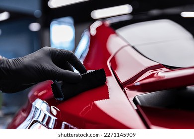 Application of ceramic coating in car detailing studio or car wash. - Shutterstock ID 2271145909