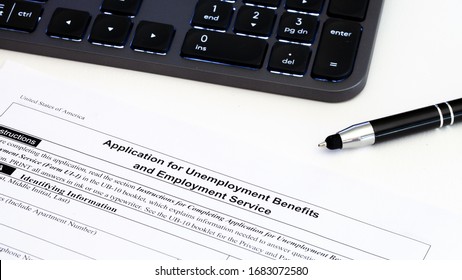 Application for employment benefits form with computer keyboard and pen on white background. Unemployment rate has risen sharply in United States due to closed business caused by corona virus outbreak - Shutterstock ID 1683072580