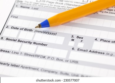 Application Form With Ballpoint Pen. Focus On Date Of Birth And Social Security Number.