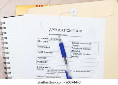 Application Form Ready To Fill Up With Pen And Envelopes