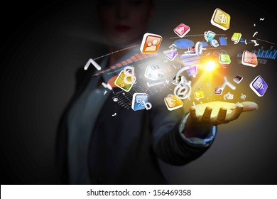 Application icons in human hand. Wireless technologies