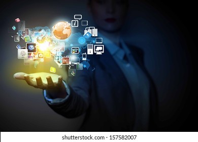 Application icons in human hand. Wireless technologies - Shutterstock ID 157582007