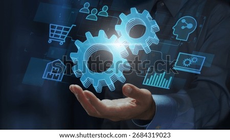 Application integration and API integration. Enterprise system with real-time data connectivity. Businessperson holding gear icons.