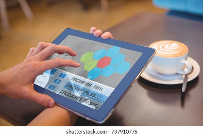 Application interface against  close-up of digital 3D tablet and coffee on table Close-up of digital tablet and coffee on table in the coffee shop