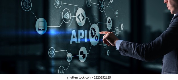 Application Programming Interface. API software development tool. Information technology concept. Businessman presses API text icon on a virtual interface - Shutterstock ID 2220252625