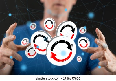 Application update concept between hands of a man in background