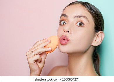 Apply Concealer And Cosmetic Highlighter. Girl Hold Applicator. Young Woman Spreading Cream On Her Face. Face Care Facial Concept. Fresh Healthy Skin, Perfect Skintone