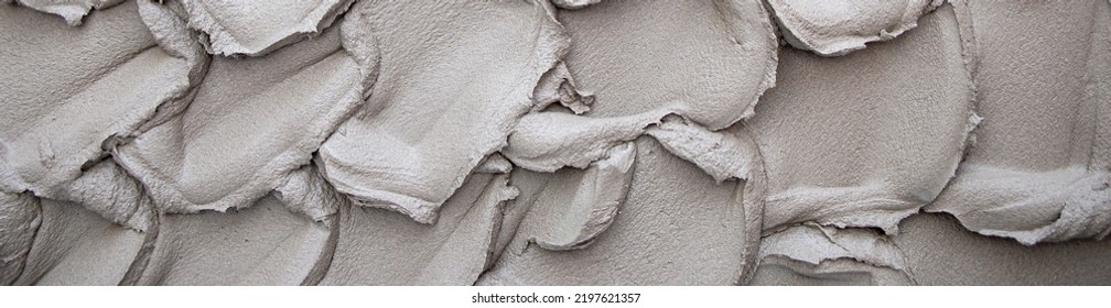 Applying Cement Plaster In A Thick Layer On A Concrete Wall By A Preliminary Method