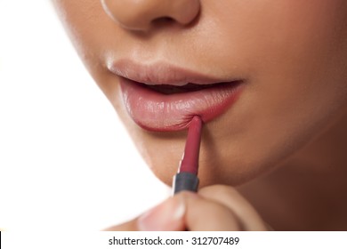 applying a lip liner - Powered by Shutterstock