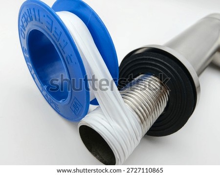 Applying PTFE thread seal tape to pipe threads ensures a leak-proof connection in plumbing and mechanical installations.