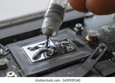 Applying The Thermal Grease To The Gpu Chip For Better Heat Management, Macro View