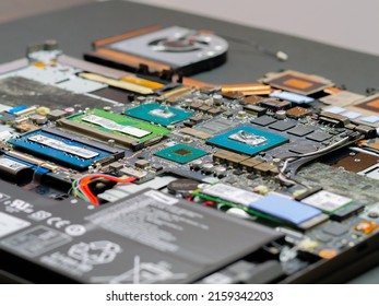 Applying Thermal Paste To The GPU And CPU Of A Laptop Computer. Thermal Grease For Better Cooling Of The Device.