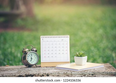 Appointment And Calendar Background Concept. Calender And Notebook For Planner To Plan Timetable, Agenda, Organization, Management Each Date, Month, And Year.Desktop Calendar 2022 Place On Office Desk