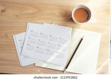 Appointment Calendar Concept. Calender, Diary, Coffee Place On Business Office Desk, Work At Home. Notebook For Planner Plan Timetable, Agenda, Appointment Management Each Date, Month, And Year