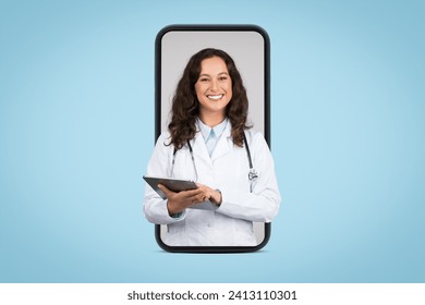 Appointment with doc online. Cheerful female doctor with digital pad and stethoscope at huge smartphone screen, isolated on blue background, collage - Powered by Shutterstock