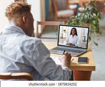 Appointment With Doctor Online. Black Guy Having Video Chat With Therapist, Receiving Professional Medical Help Remotely. African American Patient On Distance Meeting With General Practitioner