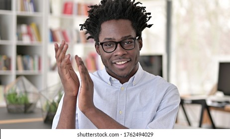 Appreciative Young African Man Clapping