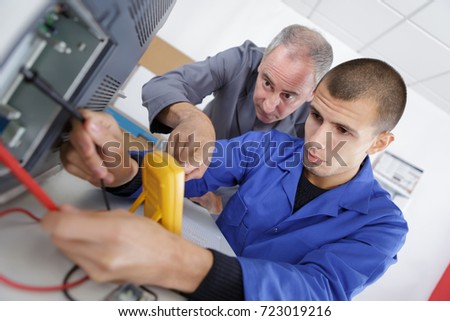 apprentice calibrating printer