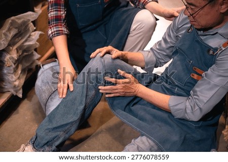Apprentice workshop tailor denim repair fitting alteration fabric training craft