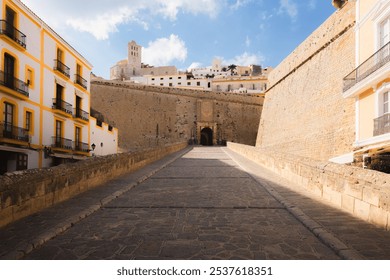 Approach to the fortified walls and Castle of Ibiza, in the historic old Ibiza Town, in the Spanish Balearic Islands on a sunny, summer day. - Powered by Shutterstock