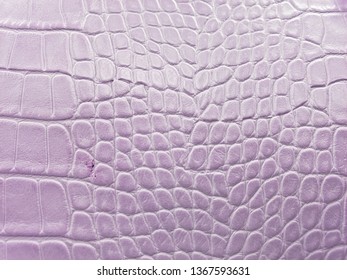 approach to leather surface in light pink color, background and texture