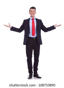 Approachable young business man with open arms , welcoming you on white background
