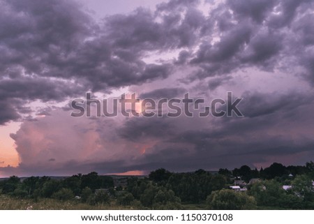  Approaching thunderstorms in the field. Supercell thunderstorm