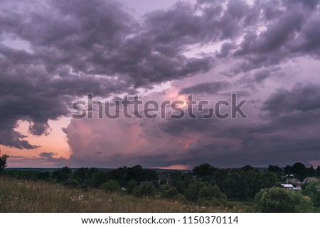  Approaching thunderstorms in the field. Supercell thunderstorm