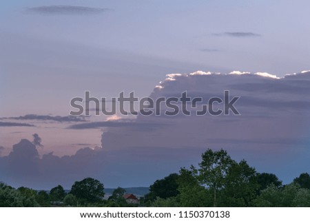  Approaching thunderstorms in the field. Supercell thunderstorm