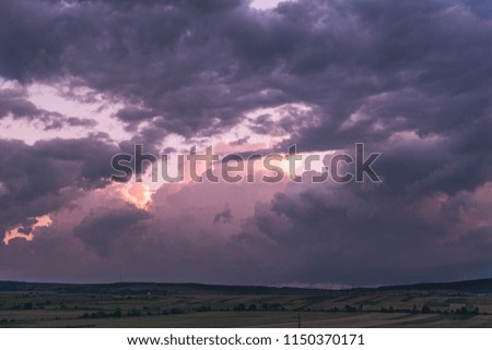  Approaching thunderstorms in the field. Supercell thunderstorm