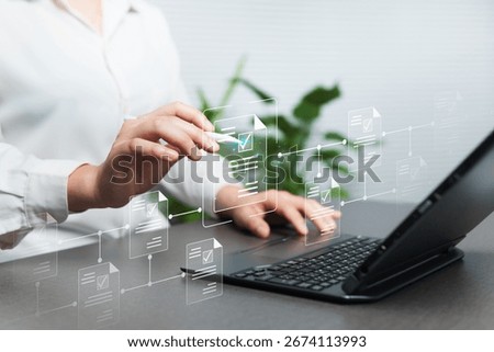 Approval of electronic documents on a virtual screen, online via laptop, document management concept, submit project reviews with highly secure data files, connection to efficient paperless systems.