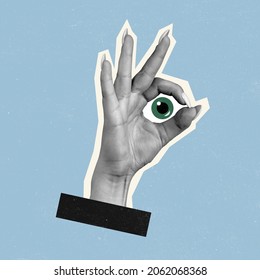 Approval sign. Contemporary art collage of human hand showing okey gesture with green eye isolated over blue background. Concept of art, creativity, imagination. Copy space for ad